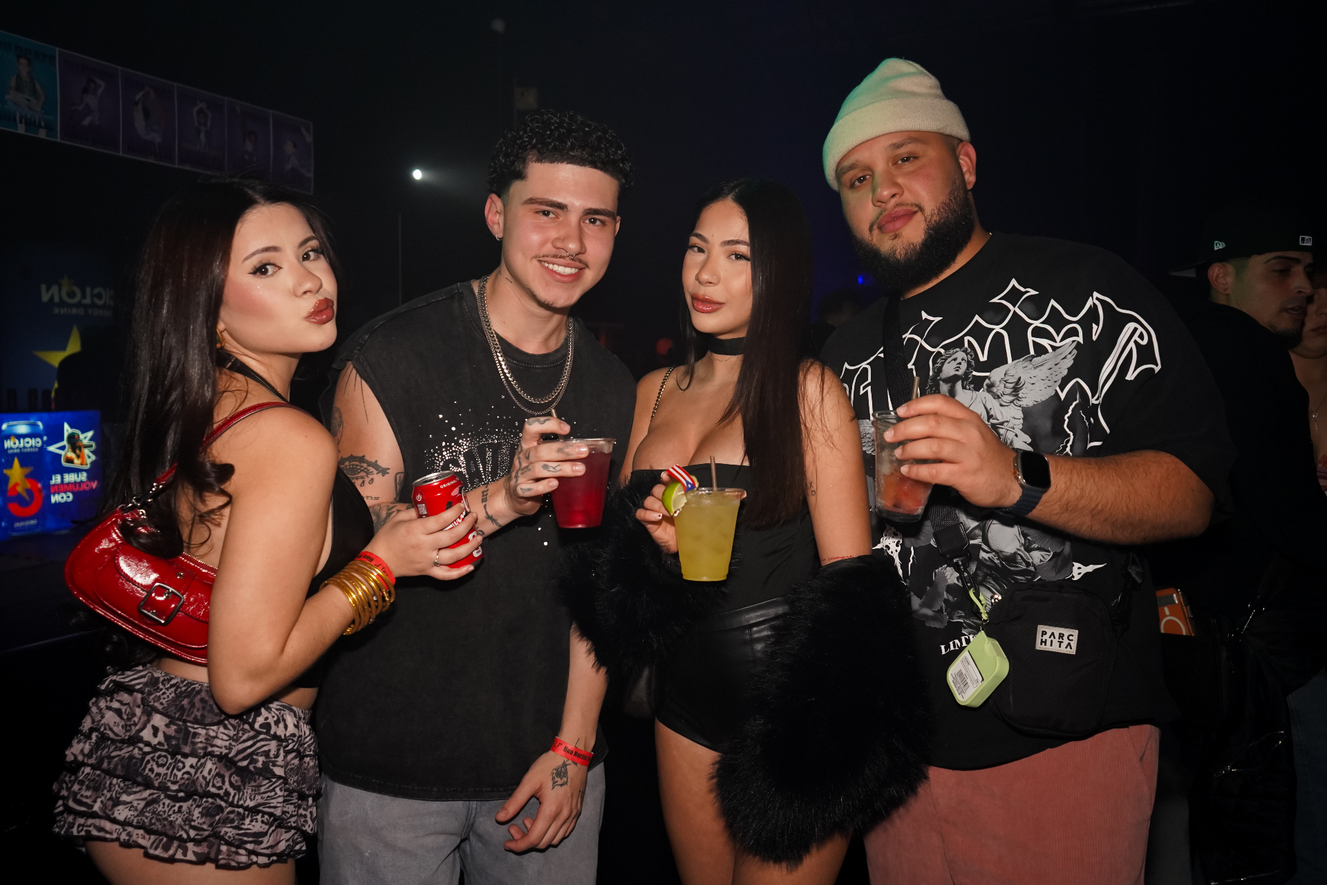 Group of friends with drinks at an event